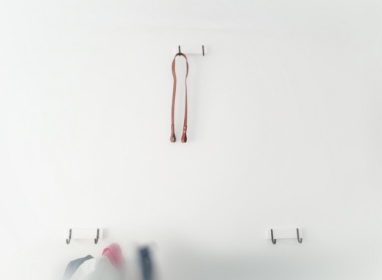 Bike hanger made from 3 HJALMAREN towel hangers and a leather strip
